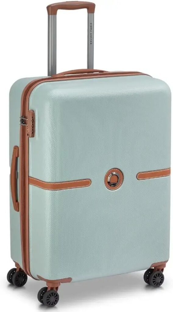 DELSEY PARIS Juliette hard-shell trolley bag in Sage Green with stylish brown trim.
