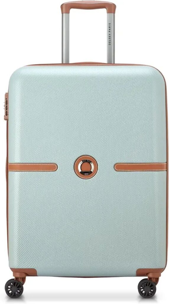 DELSEY PARIS Juliette 65.5 cm suitcase features list including ABS shell, TSA lock, and spinner wheels.